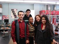 Prof. Fadi Bou-Abdallah with his research group in their lab at SUNY Potsdam